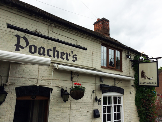 Poachers frontage with Signwriting.